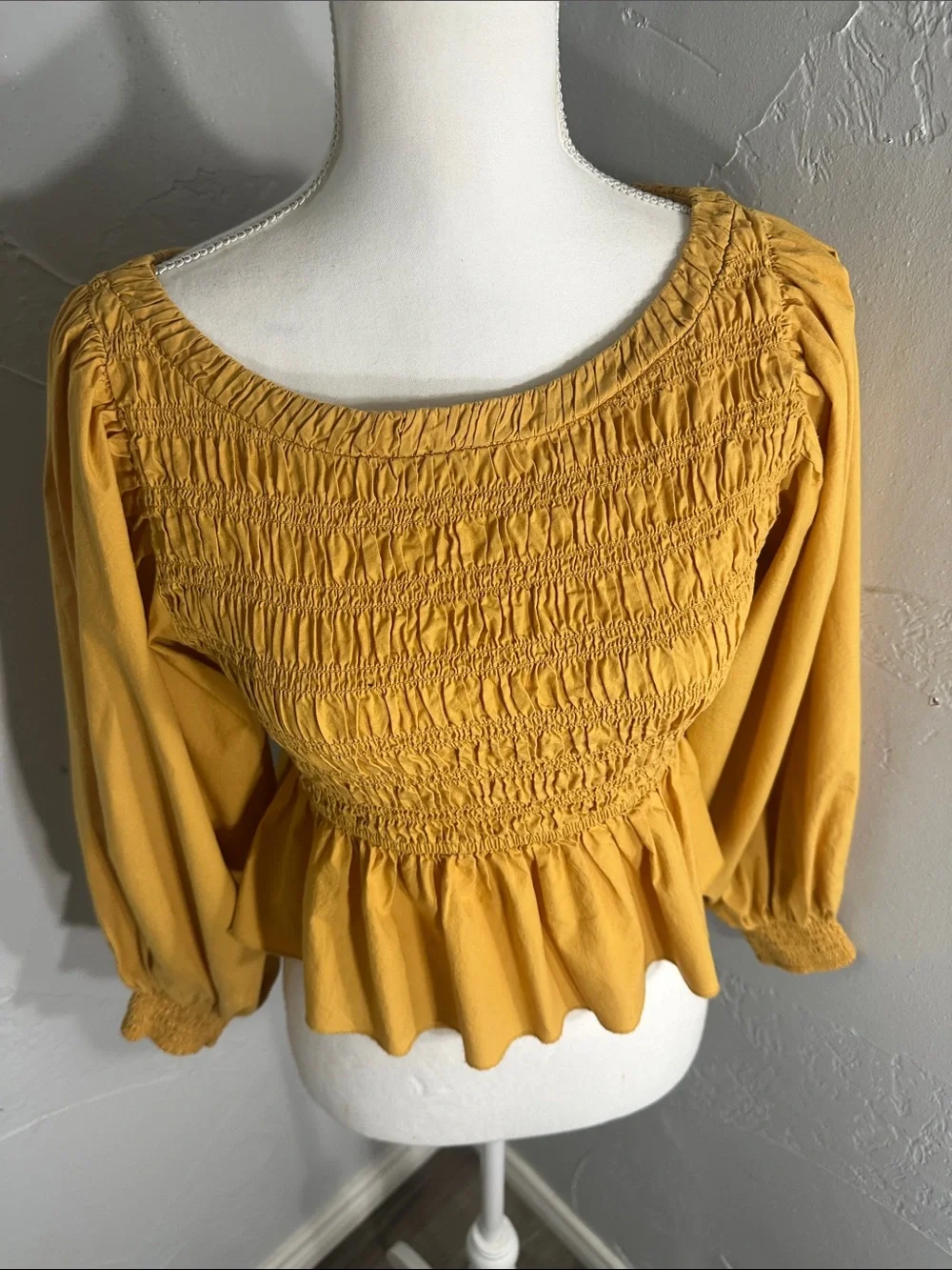 Free People mustard Yellow Smocked Peplum Blouse.